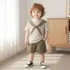 Roupa de Verão para Meninos 2026 Novo Estilo Bebê Crianças Manga Curta Listrada Estilosa Conjunto de Duas Peças de Verão para Bebê