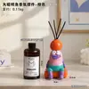 Botella difusora de aceite esencial con forma de pez payaso, linda pero fea, para rejillas de ventilación del coche, difusor de fragancia decorativo