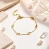 Pulsera de acero de titanio con diseño de nariz de cerdo de lujo ligero de alta gama, de venta caliente transfronteriza para mujer, joyería versátil de moda nueva, oro real, venta al por mayor