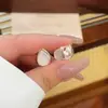 Brincos Dupla Face de Design de Nicho Exclusivo e Luxo Leve com Pedra Olho de Gato em Forma de Gota, Brincos Modernos e de Alto Padrão, Brincos Versáteis para o Dia a Dia
