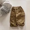 Outono 2026 Huzhou Zhili Roupa Infantil Estilo Coreano Primavera Algodão Lavado Calça de Trabalho Calças Meninas Meninos 7560