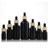 Spot de fábrica 5ml-100ml botella de aceite negro negro brillante gotero de cabeza de goma embotellado productos para el cuidado de la piel