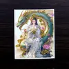 Venta al por mayor de fábrica Tíbet color oro pintura thangka tarjeta central núcleo a menudo pitón dragón femenino lienzo medio pintado a mano patrón dorado opcional