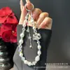 Nueva Cadena para Teléfono Móvil Kt con Lazo y Borla, Colgante Lindo de Perlas de Cristal Hecho a Mano, Venta al por Mayor