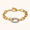 Collar con Cadena de Cable Dorado Entrelazado Transfronterizo Europeo y Americano Anillo Ovalado Acero Inoxidable Chapado en Oro de 18K Hebilla OT Pulsera y Pendientes Personalizados para Mujer