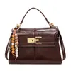 Bolsa Trapezoidal Nova Outono e Inverno 2025 Textura PU Moda Bolsa Kelly Design de Nicho Simples Bolsa de Ombro Transversal