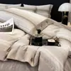 Conjunto de cuatro piezas lujoso y elegante 100% algodón cepillado, nuevo modelo 2026, funda de edredón gruesa 100% algodón puro, sábana bajera, ropa de cama