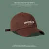 Boné de Baseball Estilo Coreano Moda Japonesa Feminino, Boné Versátil Bordado para Sol Outdoor de Nicho, Boné Masculino que Faz o Rosto Parecer Menor
