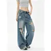 Jeans azules rasgados de pierna ancha para mujer, nuevo estilo otoño 2026, talla grande, corte holgado, adelgazante y con un diseño de pierna recta y fluido