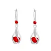 Traje de joyería de cristal de circón de venta caliente transfronteriza para mujer, diseño creativo retro europeo y americano, collar de aretes de gota de agua giratoria, moda