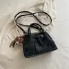 Nuevo conjunto de bolsos modelo de comercio exterior, bolso de hombro y bolso cruzado de moda de alta gama de gran capacidad en color vintage bloqueado
