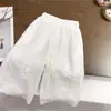 Vestido de tirantes estilo vacacional para niña estilo coreano con bordado rojo y diseño calado, top de verano moderno y pantalones de pierna ancha para exportación
