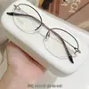 Armazones de anteojos de titanio puro para mujer, estilo business tradicional, colección de anteojos de medio aro ultraligeros, armazón de anteojos Danyang M0043