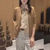 Novo design estilo coreano para o início do outono de 2026: cardigã de tricô falso de duas peças com gola alta para mulheres, caimento solto, super versátil e top que afina.
