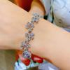 Pulseira de flor de cinco pétalas em zircônia de alta qualidade, nova sensação da moda para transmissão ao vivo, simulação de diamante Mosane importado, joia para mão feminina