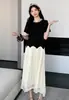 Moda de Verano 2025 Nuevo Costura Simple Longitud Media Holgado Cubre Barriga de Embarazada Adelgazante Exquisito Vestido de Maternidad