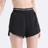 Shorts de Corrida Feminino de Secagem Rápida com Design Anti-Exposição, Adequado para Fitness, Maratona, Corrida Leve, com Bolsos, Calça de Yoga Três Pontos, Caimento Solto para Uso ao Ar Livre
