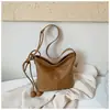 Bolso de Cubo Retro de Color Sólido de Gran Capacidad Transfronterizo para Mujer 2026 Principios de Otoño Nuevo Bolso de Hombro Cruzado de Moda para el Trabajo