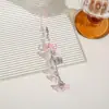 Nuevo estilo cadena de orquídea lirio llavero colgante pajarita hueca accesorios metálicos mariposa creativa decoración de concha de oreja para bolsa