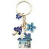 Llavero de Flor Azul de Esmalte Creativo Transfronterizo, Mariposa, Casa de Hongos, Llavero de Nicho Lindo, Accesorio para Bolso, Colgante