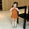 Estilo Coreano 2026 Verano Nuevo Estilo para Niñas, Sencillo Estilo Ins Chaleco de Punto sin Mangas con Solapa Hueca y Conjunto de Falda