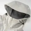 Estilo Outono/Inverno para Casais Transfronteiriço Corte 3D Corta-vento e Impermeável com Capuz Jaqueta Softshell Roupas de Montanhismo 6970