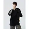 2026 Verano Nuevo Resistente Estilo Étnico Diseño Bordado Camiseta de Manga Corta para Jóvenes Hombres Corte Holgado Top de Moda