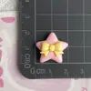Creativo Lazo Doble Estrella Dibujos Animados Estilo Nuevo Accesorios de Resina DIY Pegamento de Crema Funda para Teléfono Móvil Paquete de Materiales al por Mayor