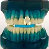Dientes Postizos de Cobre Zirconia Cuadrados Cruzados Chapados en Oro Real Hip-Hop Dientes de Oro Personalizados Accesorios Versátiles de Dientes Falsos Europeos y Americanos Rap