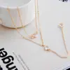 Moda transfronteriza europea y americana simple geométrica borla cuenta redonda clavícula multicapa temperamento popular collar largo al por mayor