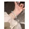 Pulsera Nueva de Perlas y Mariposa Tianyu 2024 Diseño de Nicho Ins Pulsera Versátil con Borlas como Regalo para Mejores Amigas