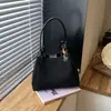 Bolso de Hombro de Gran Capacidad Estampado de Leopardo Lujo Ligero Nicho 2026 Cubo Nuevo Bolso de Mano para Mujer Bolso de Cuero Suave para Viajes Diarios