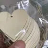 Venta caliente transfronteriza de virutas de madera en blanco DIY para el Día de San Valentín, decoración creativa navideña, colgante pintado a mano en forma de corazón.