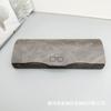 Venta al por mayor del fabricante Gafas para miopía Estuche para gafas de espejo plano Portátil de alta gama Antiestrés Cuero personalizado PU Cordero simple