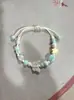 Vendedor ambulante de bisutería, Pulseras tejidas para mujer en zona escénica, Cerámica étnica de nudo Jingdezhen hecha a mano, En stock, Estilo artístico