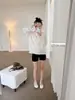 Camiseta feminina versátil de manga longa estilo coreano ovinsyang, nova coleção outono 2026, corte solto e relaxado, perfeita como camada base