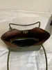 Bolsa de palha tecida da moda para mulheres, versão coreana de verão de 2026, elegante e texturizada, bolsa de ombro e de axila casual de grande capacidade