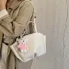 Bolso tote de lujo ligero de nicho de alta gama para mujer 2026 nuevo diseño de moda bolso de mano tipo cesta de verduras bolso grande simple para el día a día