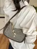 Bolsa de Tofu Trançada Fashion Tendência para Mulheres Verão 2026 Novo Estilo Ins Simples Casual Bolsa Saco Bolsa de Ombro para o Dia a Dia