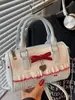 2025 Nuevo Estilo de Verano Dulce Femenino Corazón Bolso Boston Rosa Lazo Nicho Viajero Hombro Cruzado Bolso de Mano