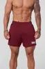 Pantalones cortos deportivos para hombre YOUNGLA, shorts de fitness de secado rápido, pantalones tejidos rectos de tres cuartos elásticos de corte ajustado