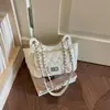 Bolso acolchado con cadena de moda estilo coreano transfronterizo para mujer, nuevo modelo 2026, bolso de hombro tipo Chanel, bolso simple de hombro y cruzado
