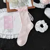 Calcetines de lazo de cinta Lolita para primavera y verano para mujer, calcetines de malla de canalé hasta la pantorrilla con forma de corazón hueco, calcetines dulces apilables estilo universitario