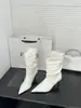 []Chegada Nova Outono/Inverno 2026 Bico Fino Salto Agulha Estilo Europeu e Americano Botas Curtas Femininas Dobráveis Botas da Moda Botas de Cano Médio
