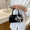 Bolso de bowling retro de nicho, bolso de mano para mujer, nueva colección otoño 2026, bolso de hombro simple, bolso cruzado, bolso Boston