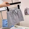 Saia Infantil Estilo Coreano 2026 Verão Nova Saias para Bebê Menina Versátil Moda Mini Saia Evasê