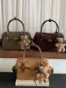 Novedad Otoño 2026 Bolso Cruzado Personalizado de Nicho con Temperamento de Alta Apariencia Elegante a la Moda Bolso de Mano para el Trabajo y el Viaje Moderno