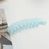 Nueva pinza banana de plástico de alta gama con dientes para cabello voluminoso, pinza vertical a la moda, accesorio base fresco y dulce.