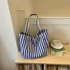 Bolso de lona a rayas de moda para mujer 2026 nuevo modelo bolso tote de gran capacidad bolso de hombro casual de gran capacidad para el trabajo