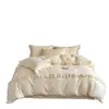 Juego de ropa de cama de cuatro piezas con ribete de encaje de lujo ligero, con una paleta de colores suave y cremosa, hecho de algodón lavable y amigable con la piel, e incluye un juego de tres piezas para dormitorio